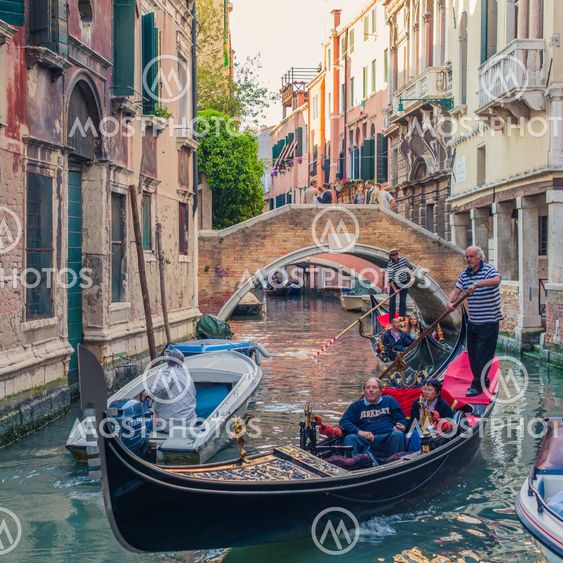People in Venice gondolas