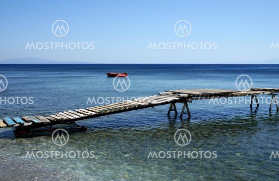 red boat and jetty