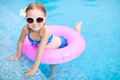 Little girl at swimming pool