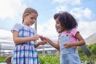 Field trip, learning and snail with school girls on farm...
