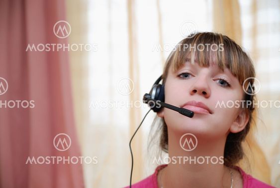Smart young woman using head-set