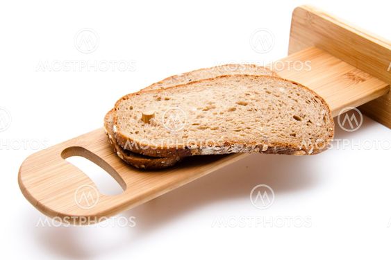 Brown Bread on wooden plate