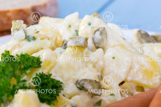 Potato salad with sausage and mustard