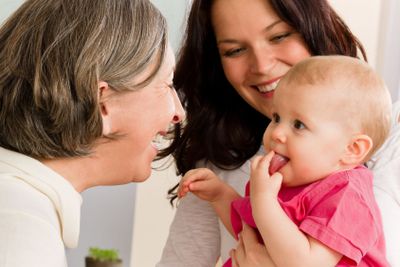 Happy family women - grandmother, mum and baby