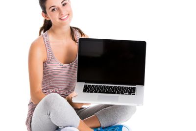 Happy student with a laptop