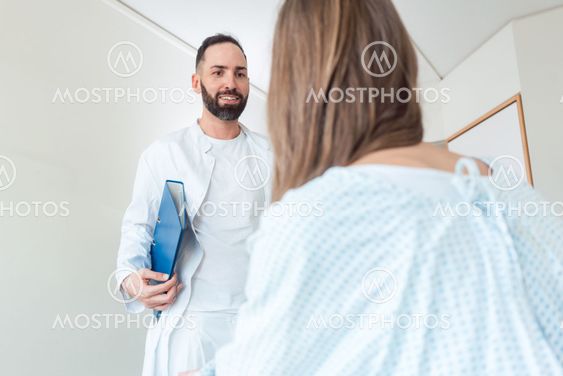Doctor seeing patient in hospital