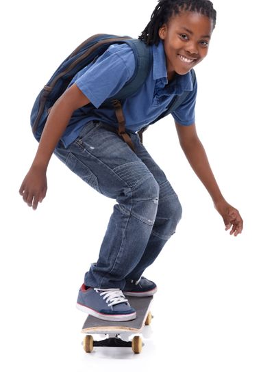 Skateboard, student or portrait of African kid in studio...