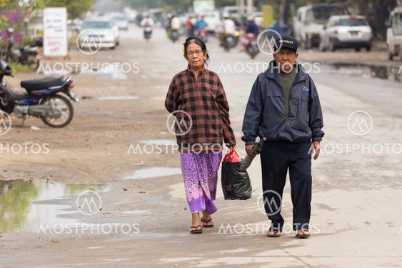 Burmese mature couple walking