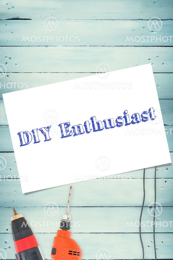 Diy enthusiast against tools on wooden background