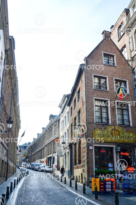 Brussels, Belgium - April 2015: Preserved old European-style residential and commercial buildings on streets of Brussels City, Belgium