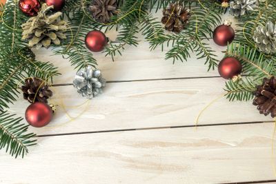 Christmas decoration with branches from fir cones and toys