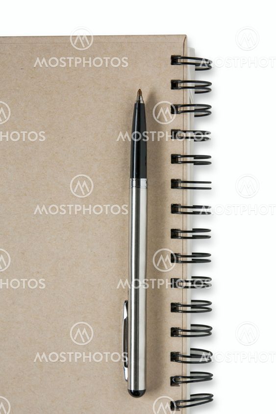 A pen on a spiral notebook