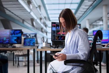 Multicultural Businesswoman Texting