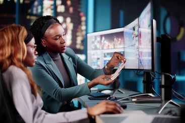 Late-night Graphic Designer Creating Colorful Web Designs