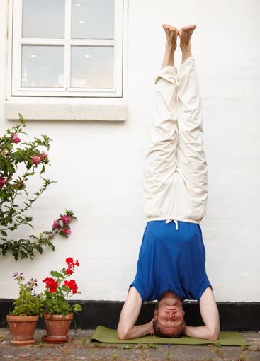 Outdoor, headstand and man with fitness, exercise and...