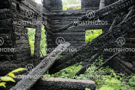 burned-down wooden house