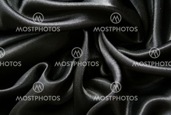 Smooth elegant black silk as background