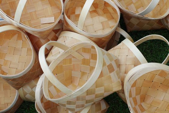 Large wicker striped baskets with handles made of...