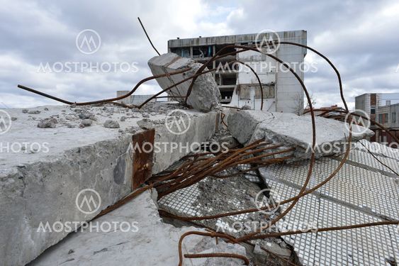 Pieces of Metal and Stone are Crumbling from Demolished Building Floors