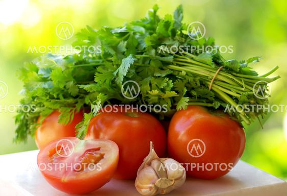 Tomato, garlic and green cilantro.