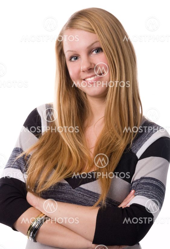 A smiling blonde on white background in studio.
