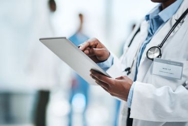 Healthcare, technology and hands of person with tablet...