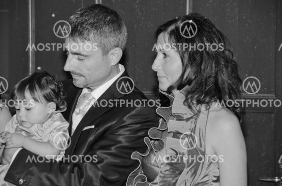Bride, Groom and Daughter after Wedding