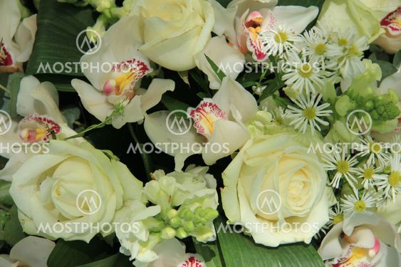Orchids and roses in bridal bouquet