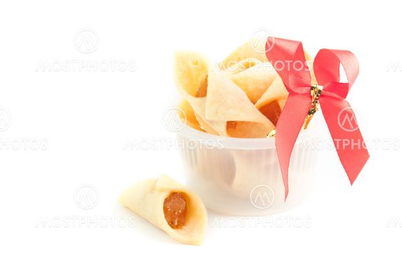 Cookies with pineapple jam on the white background