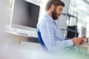 Man, typing and professional with phone in office, event...