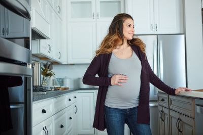 Shes ready to meet her little one. an attractive young...