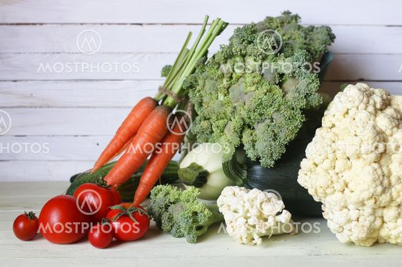 Fresh vegetables rustic wooden background