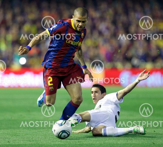 Alves and Di Maria players of football for Barcelona and Real Madrid