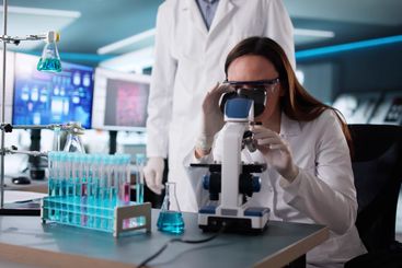 Female and male researcher develop vaccine