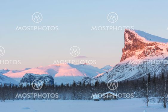 Sarek national park with Mount Namatj and Skefe in winter landscape