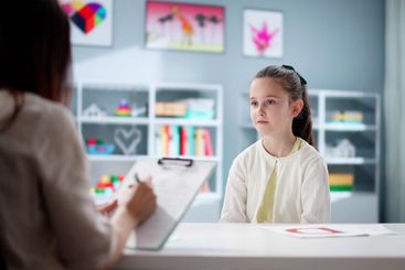 Psychiatric Social Worker Treating Child Patient