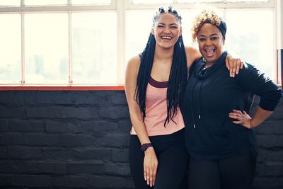 We can do this together. Portrait of two cheerful young...
