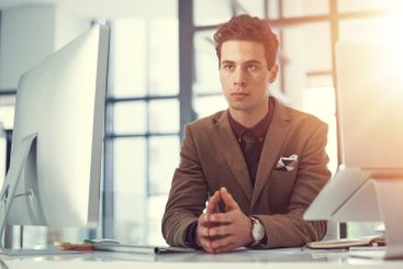 Thinking, computer and planning with business man in...