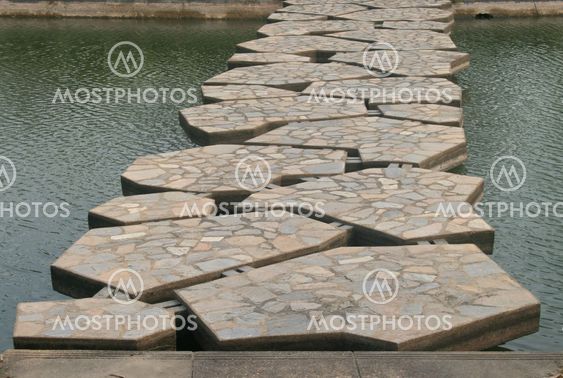 stone bridge in beautiful garden