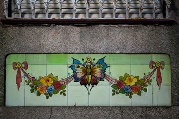 Azulejo tiles on an aged traditional Portuguese house