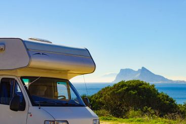 Caravan on spanish coast, Gibraltar rock on horizon
