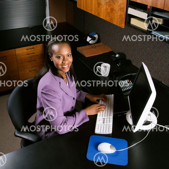 Business woman in office.