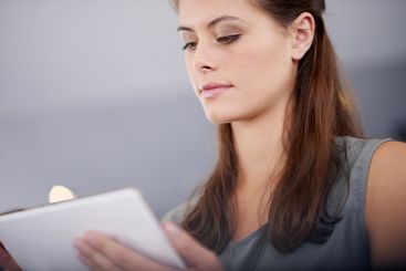 Tablet, creative and business woman in office for event...