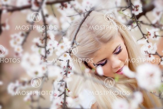 Girl in blossom garden