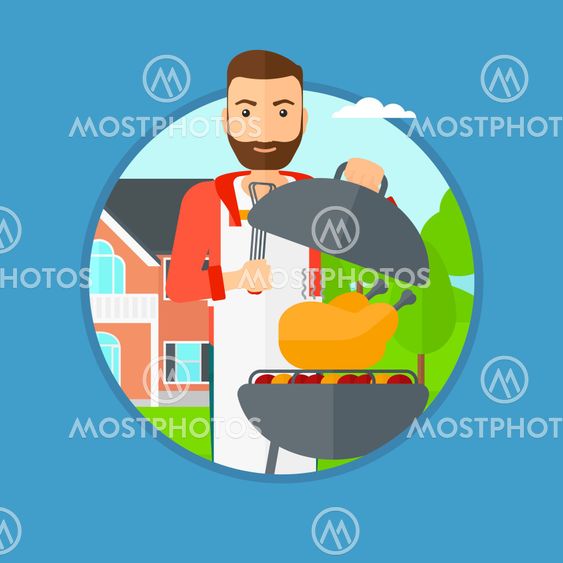 Man cooking chicken on barbecue grill.