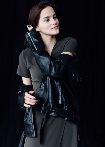 Beautiful fashionable slim woman in green summer and...