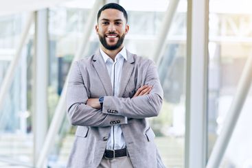 Professional portrait, arms crossed or happy business...
