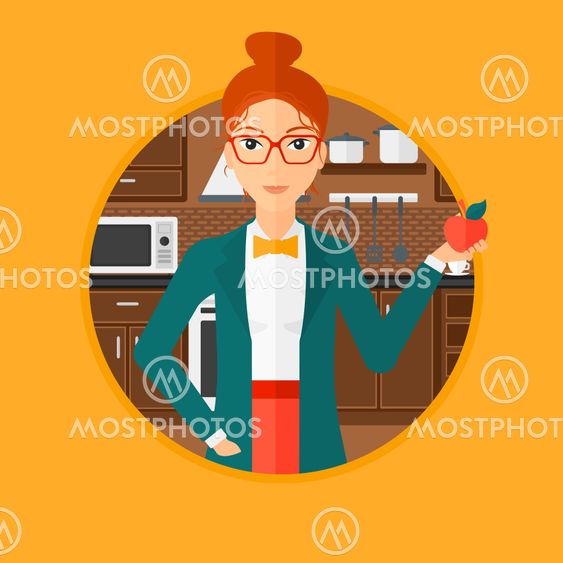 Young woman with apple in the kitchen.