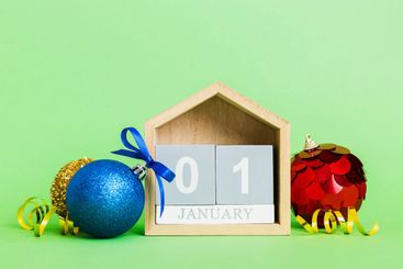 1 january. Christmas composition on colored background...