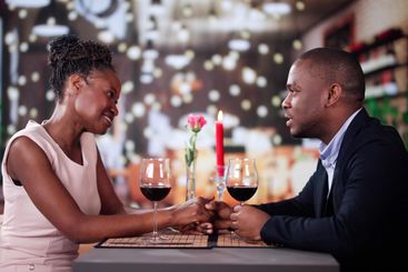 Lovely Young Couple Having Romantic Dinner